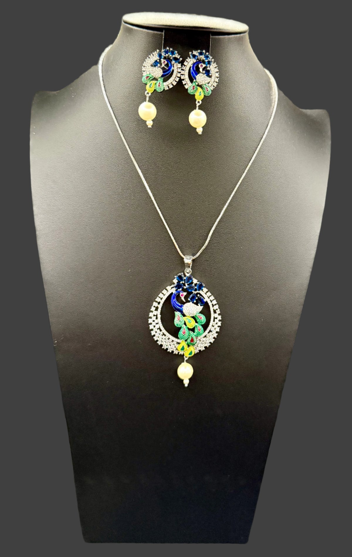Peacock Pendants Set with earrings | Peacock sitting on swing– Famaza Couture