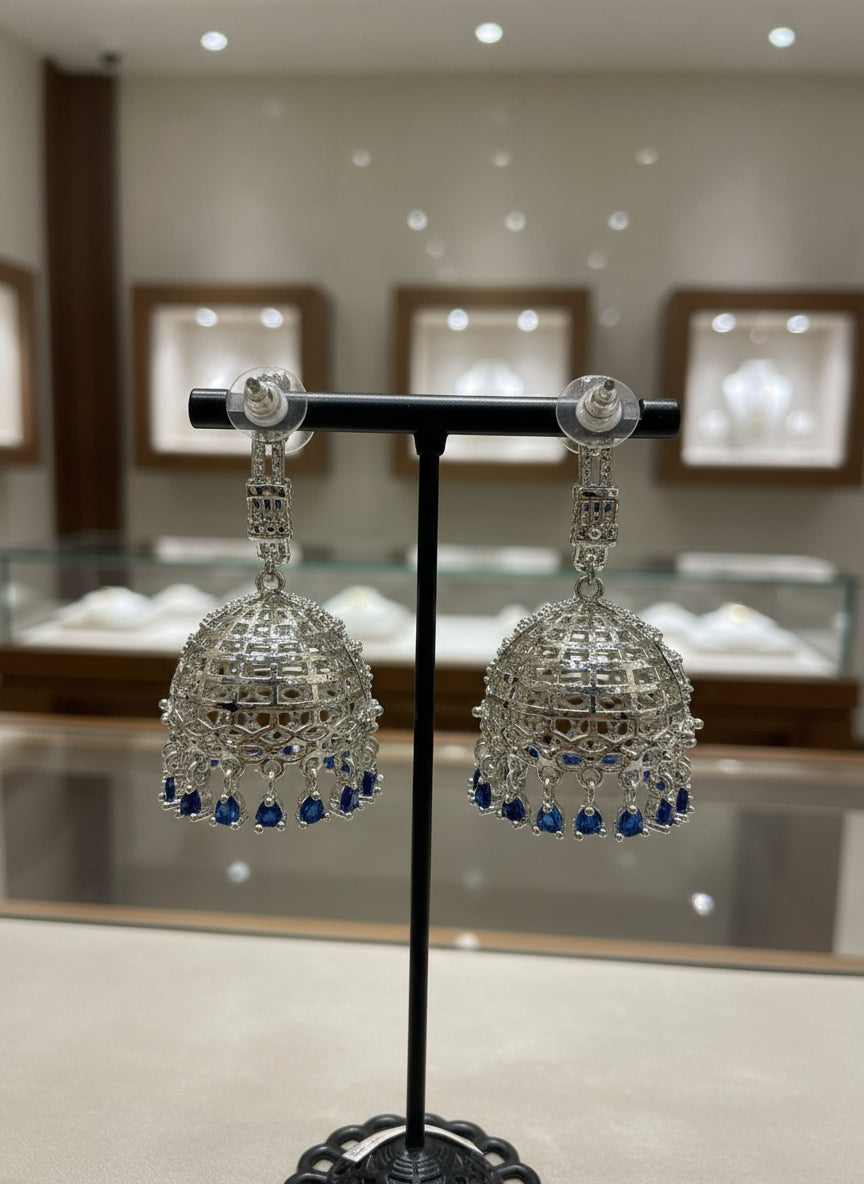 American Diamonds with blue sapphire stone Jhumka/ Silver Finish Earrings