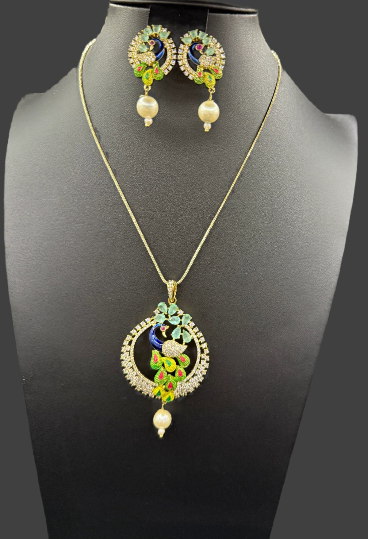 Peacock Pendants Set with earrings | Peacock sitting on swing– Famaza Couture