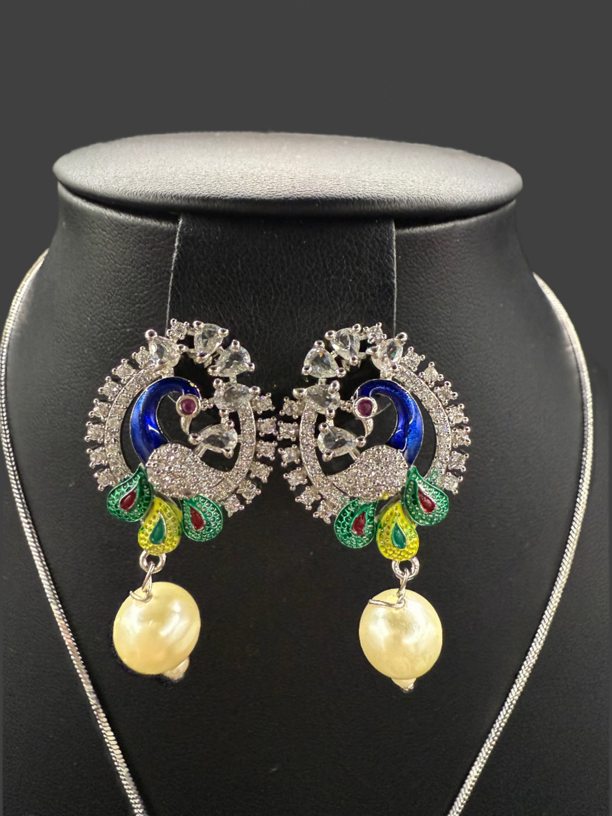 Peacock Pendants Set with earrings | Peacock sitting on swing– Famaza Couture