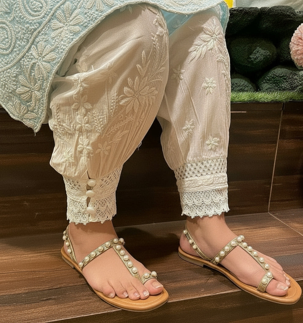 Afghani cotton pants close up on model sitting down