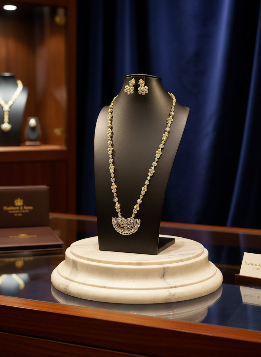 long necklace Gold plated with silver and golden polished and white and golden stones of American diamondsand two earrings set by famaza couture