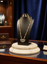 long necklace Gold plated with silver and golden polished and white and golden stones of American diamondsand two earrings set by famaza couture