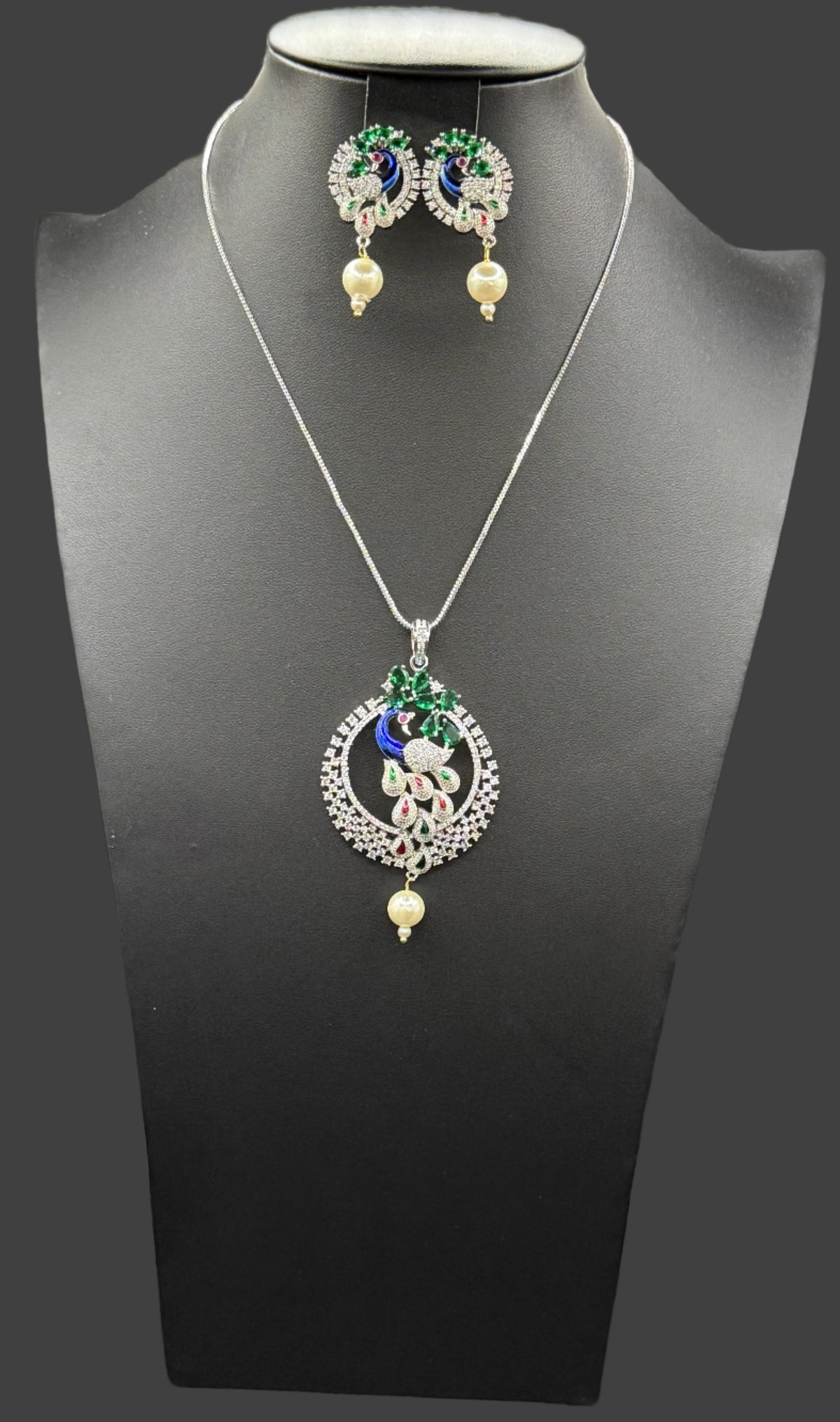 Peacock Pendants Set with earrings | Peacock sitting on swing– Famaza Couture