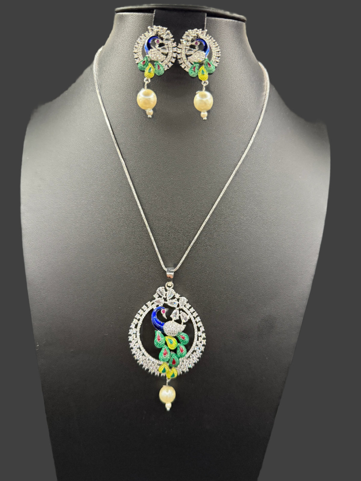 Peacock Pendants Set with earrings | Peacock sitting on swing– Famaza Couture