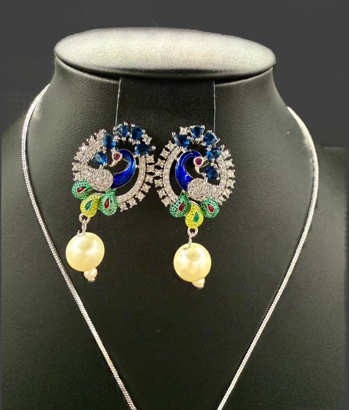 Peacock Pendants Set with earrings | Peacock sitting on swing– Famaza Couture