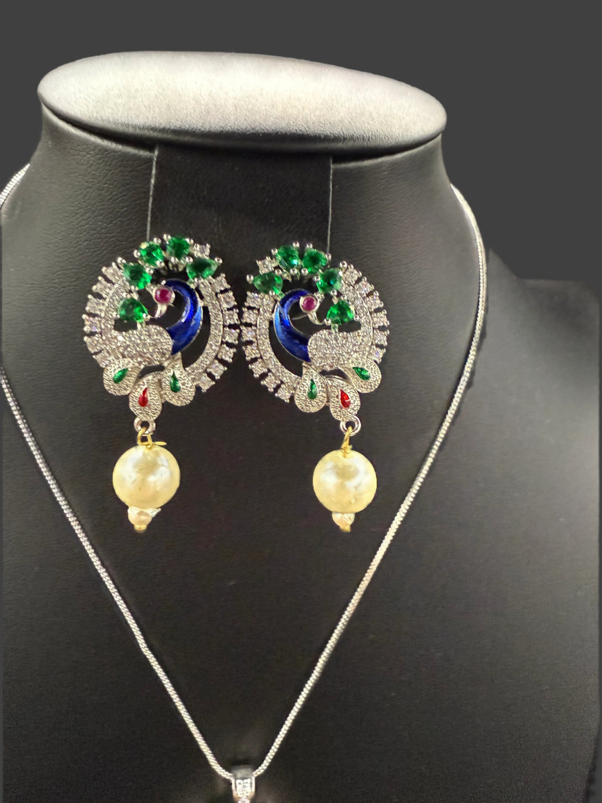 Peacock Pendants Set with earrings | Peacock sitting on swing– Famaza Couture