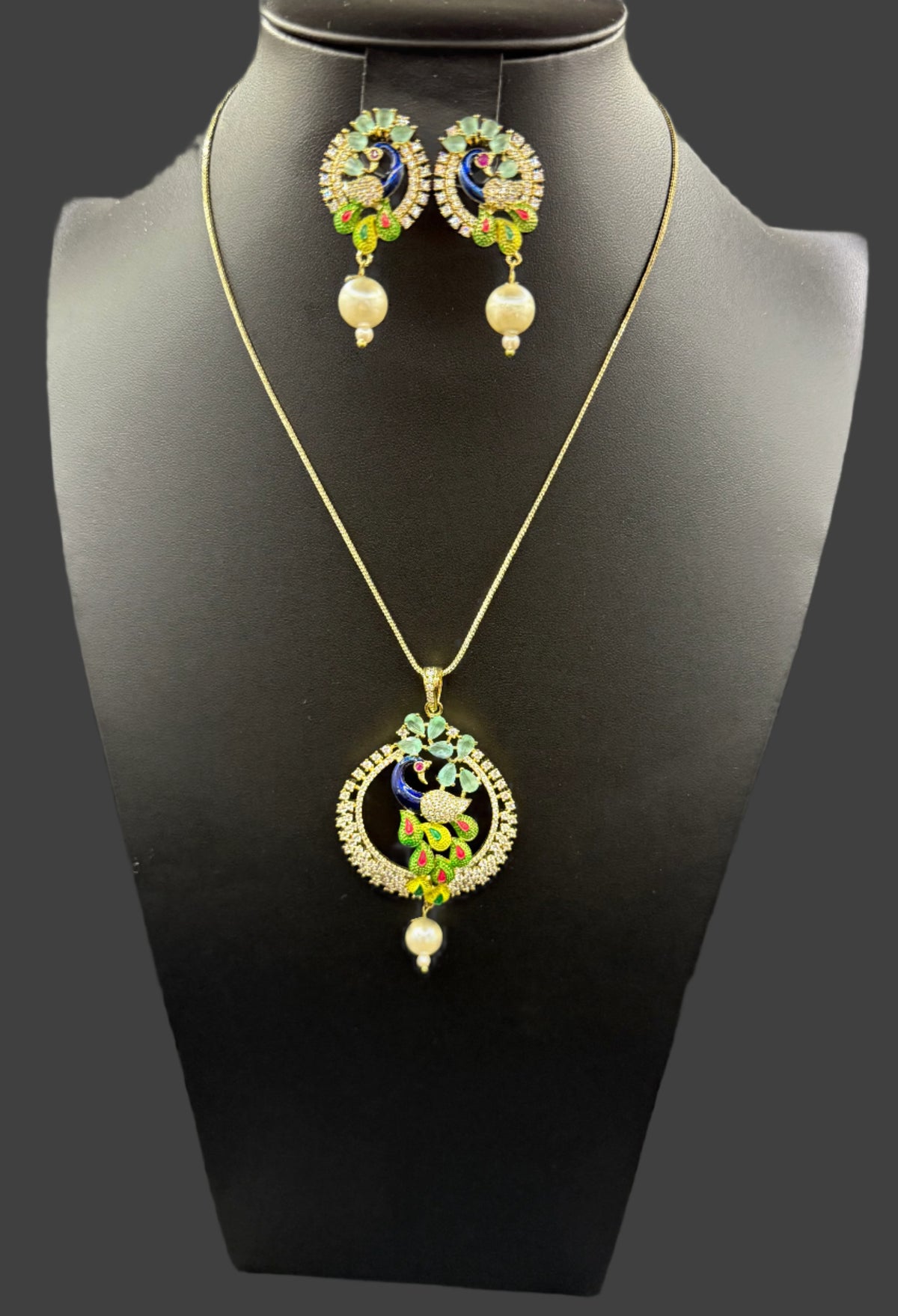 Peacock Pendants Set with earrings | Peacock sitting on swing– Famaza Couture