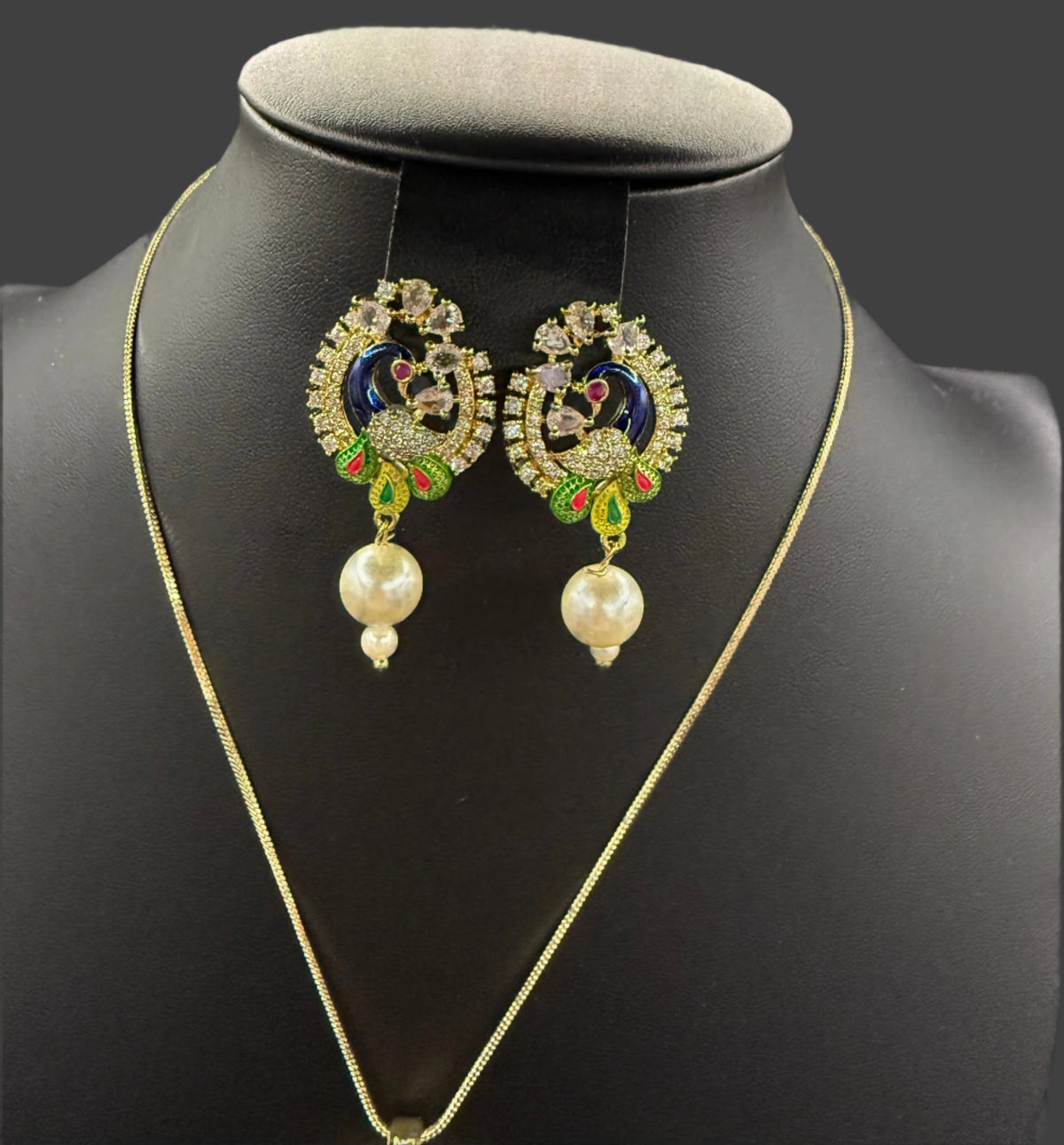 Peacock Pendants Set with earrings | Peacock sitting on swing– Famaza Couture