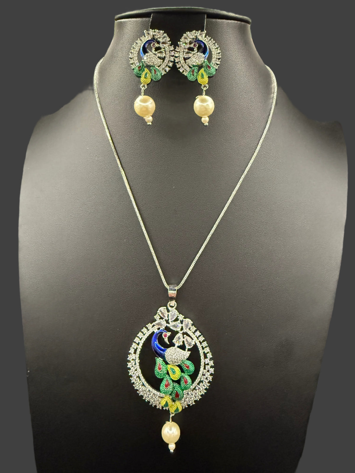 Peacock Pendants Set with earrings | Peacock sitting on swing– Famaza Couture