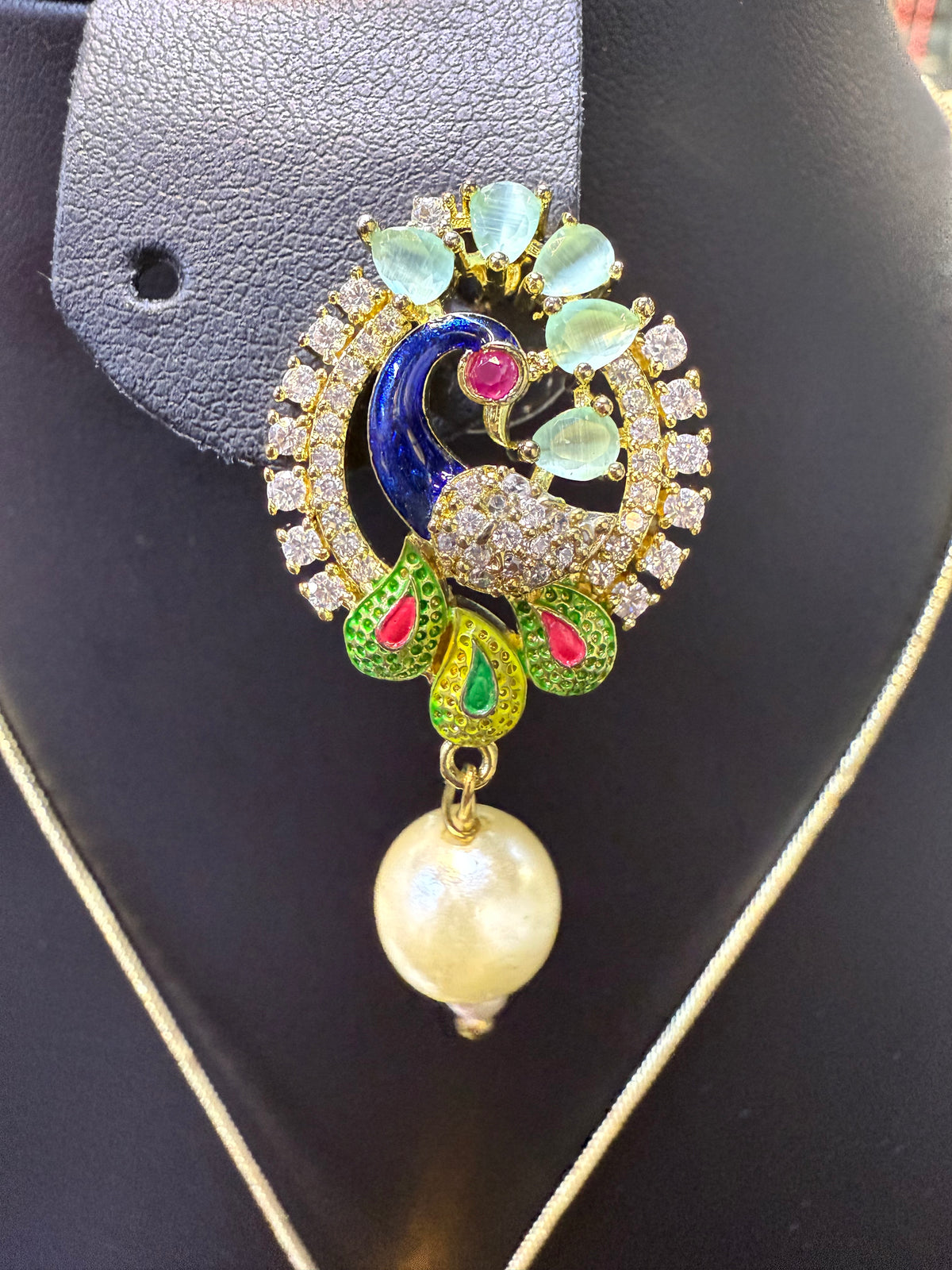 Peacock Pendants Set with earrings | Peacock sitting on swing– Famaza Couture