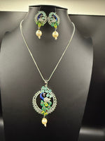 Peacock Pendants Set with earrings | Peacock sitting on swing– Famaza Couture