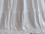 White premium rayon skirt with dense ghasspati work on bottom two flare layers