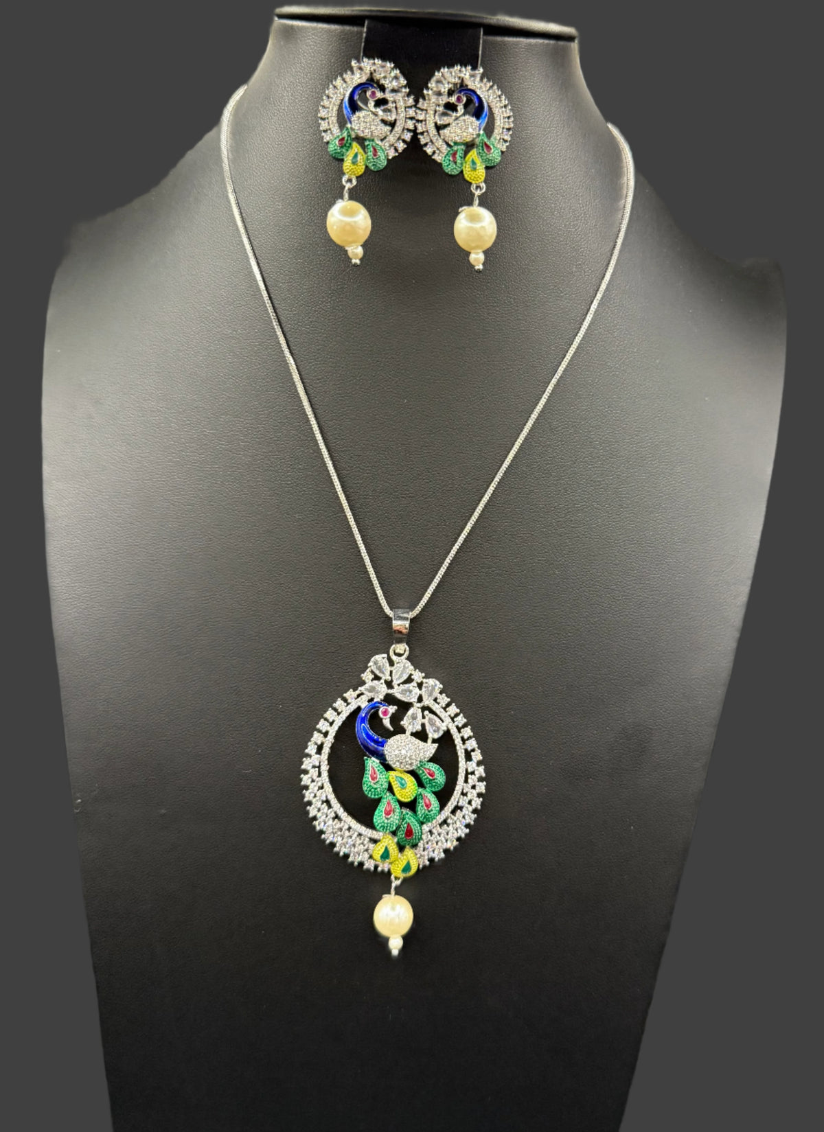 Peacock Pendants Set with earrings | Peacock sitting on swing– Famaza Couture