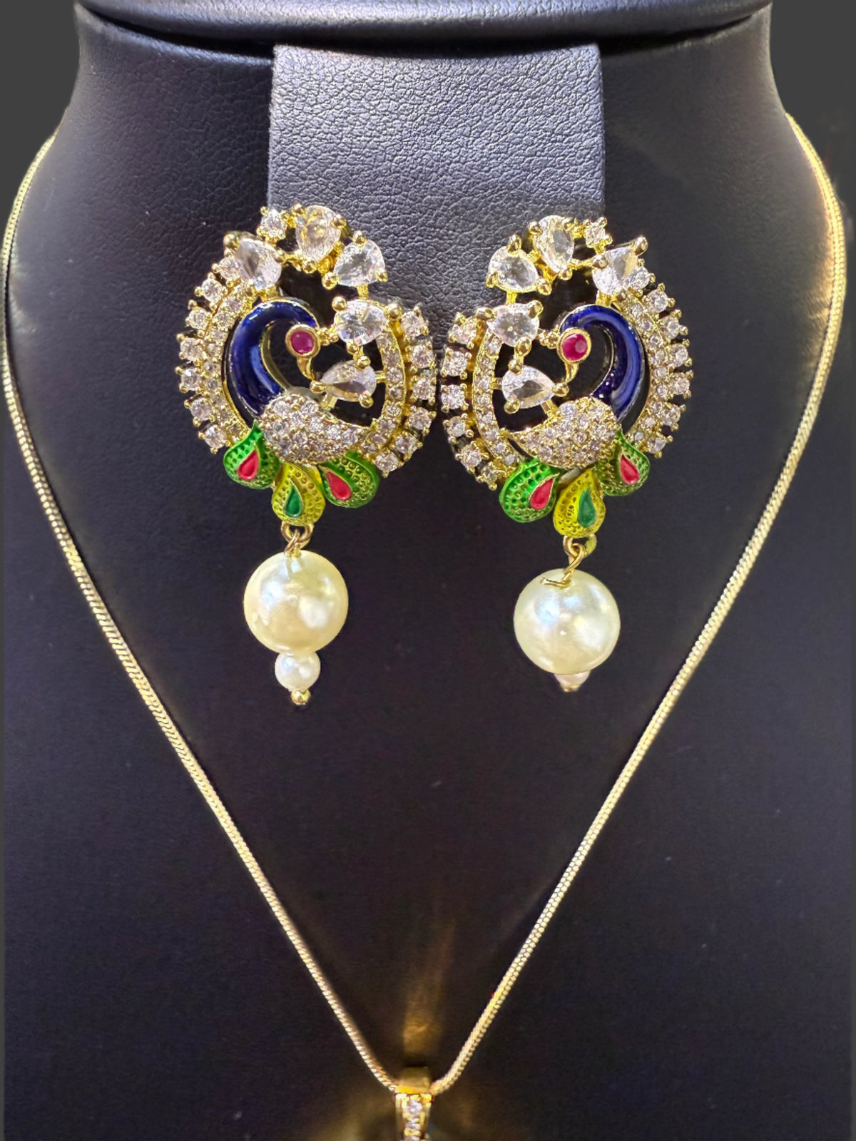 Peacock Pendants Set with earrings | Peacock sitting on swing– Famaza Couture