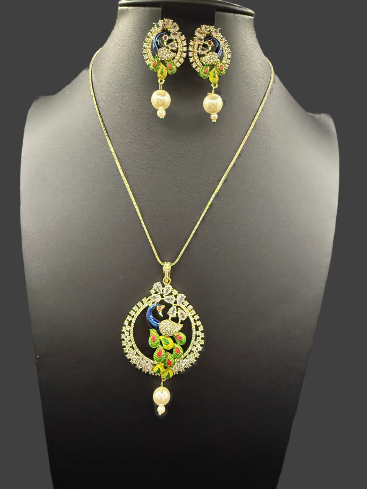 Peacock Pendants Set with earrings | Peacock sitting on swing– Famaza Couture