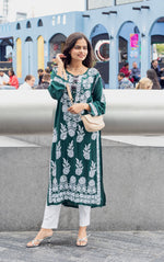 Full view of model wearing Chikankari Kurti Leaf Floral Border