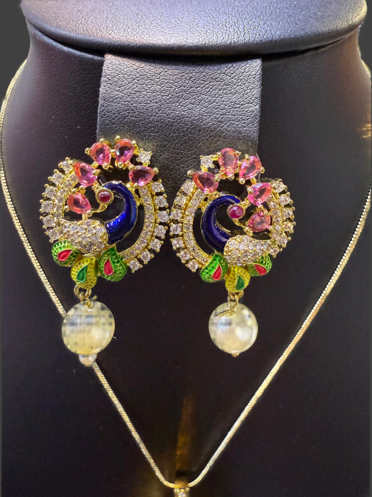 Peacock Pendants Set with earrings | Peacock sitting on swing– Famaza Couture