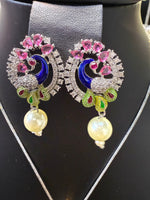Peacock Pendants Set with earrings | Peacock sitting on swing– Famaza Couture