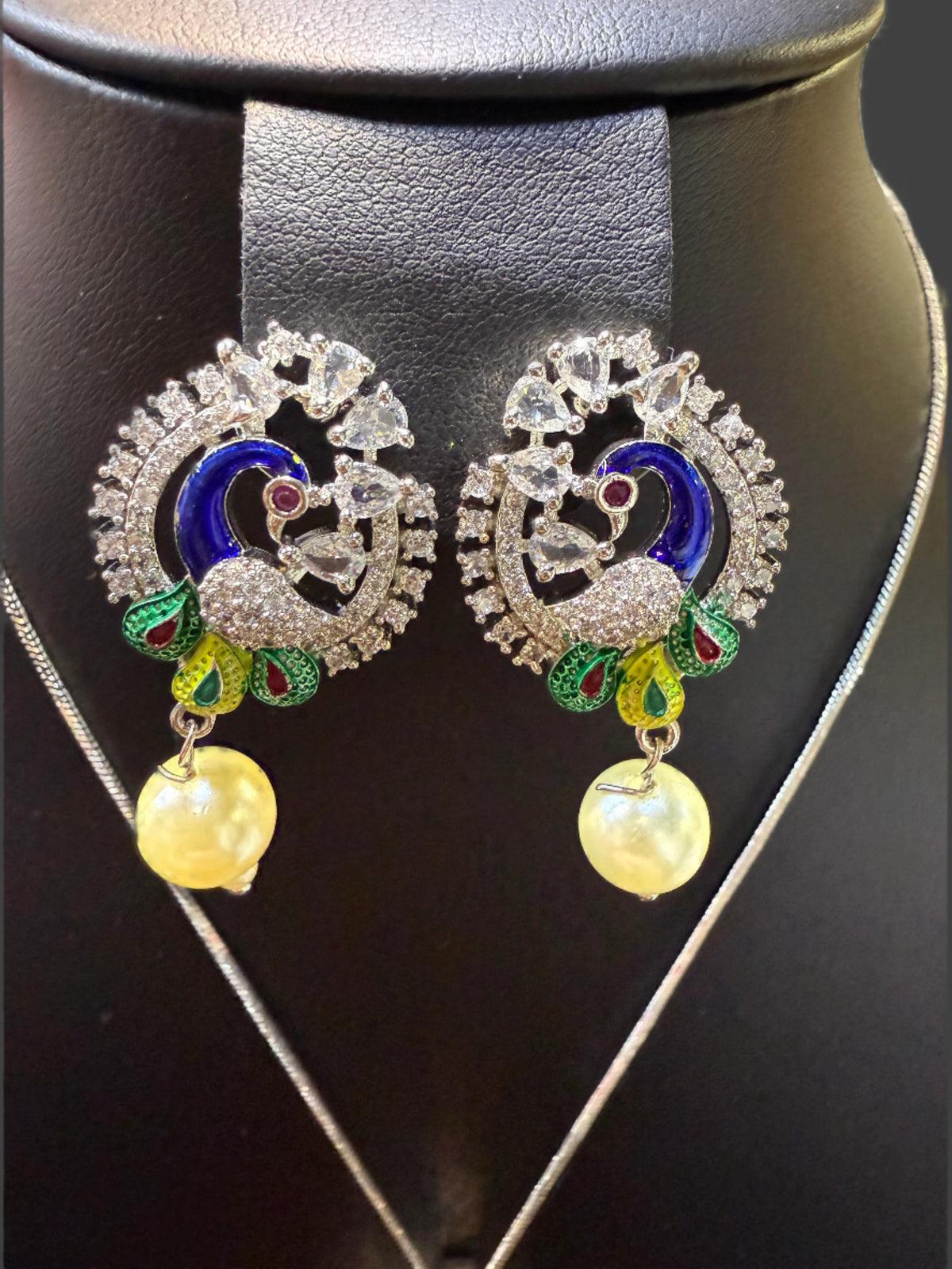 Peacock Pendants Set with earrings | Peacock sitting on swing– Famaza Couture