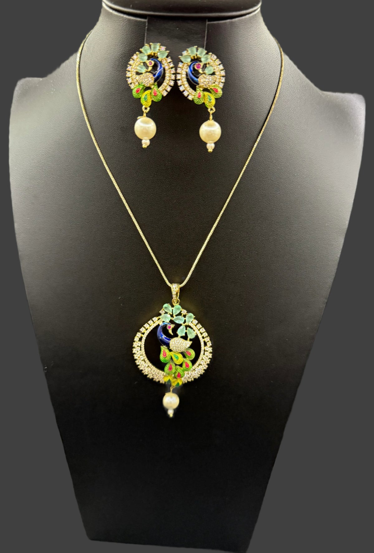 Peacock Pendants Set with earrings | Peacock sitting on swing– Famaza Couture