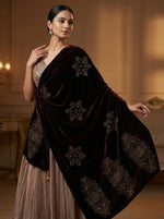 ABrown colourvelvet stole with golden stones work all over the stole.