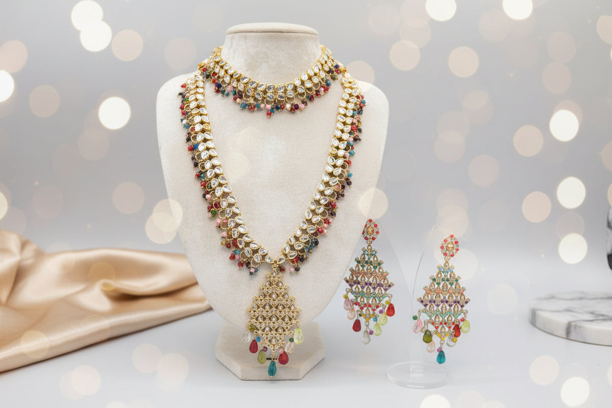 A Gold plated Kundan choker with multi colour nano beads and matching V design mala and matching earrings.