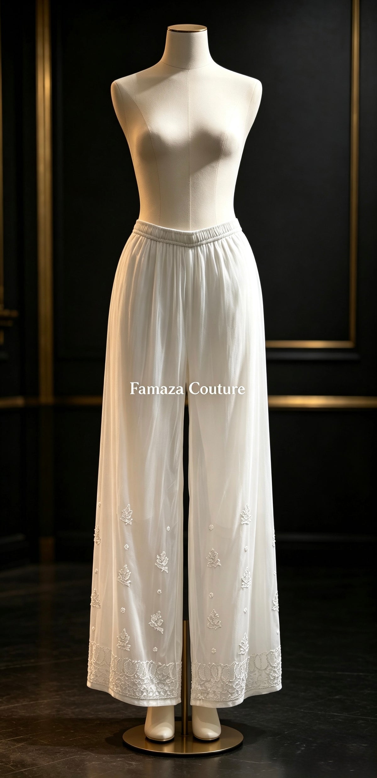 A White viscose trousers with ghasspati hand embroidery