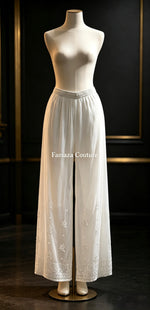 A White viscose trousers with ghasspati hand embroidery