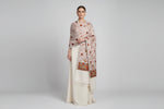 A beige base colour shawl Close-up of a Kashmiri embroidered pashmina scarf featuring geometric and floral patterns primarily in pink and green colours with a gold border.