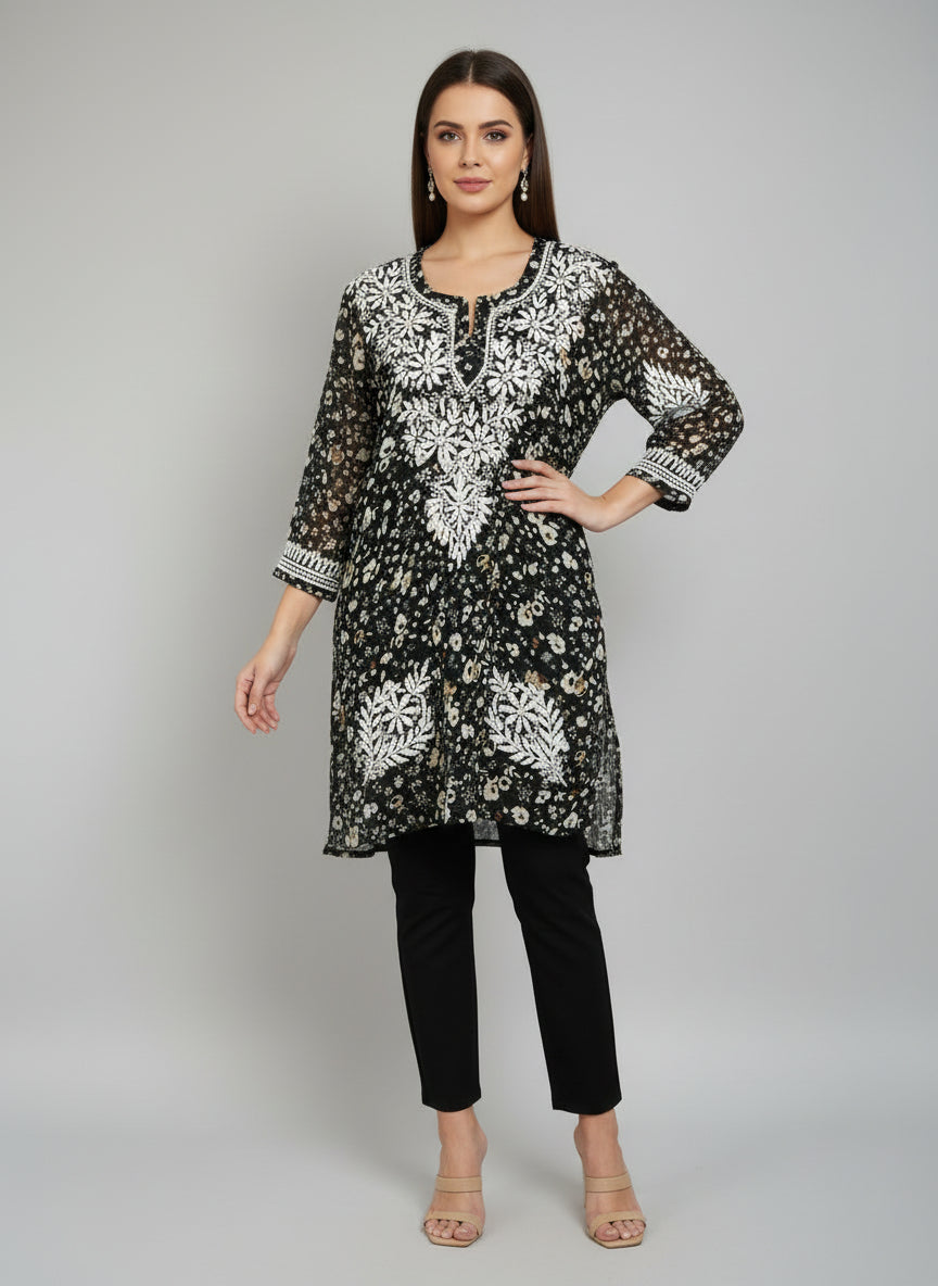 A black colour georgette kurti with floral chikankari printed and hand embroidered motifs.