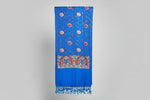A blue base colour shawl Close-up of a Kashmiri embroidered pashmina scarf featuring geometric and floral patterns primarily in pink and green colours with a gold border.
