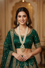 A five layer imitation pearl necklace set with a kundan pendant and matching kundan earrings party wear jewellery set