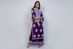 A floral embroidered purple kurta set with palazzo trousers.