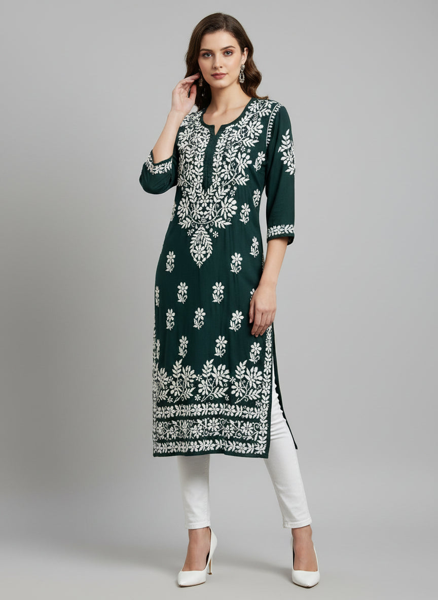A fully hand embroidered bottle green colour modal fabric 46 inches long kurti with white floral motifs and detailed border work.