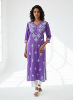 A lavender colour 46 inches long modal fabric Chikankari kurti with white Ghass Patti embroidery