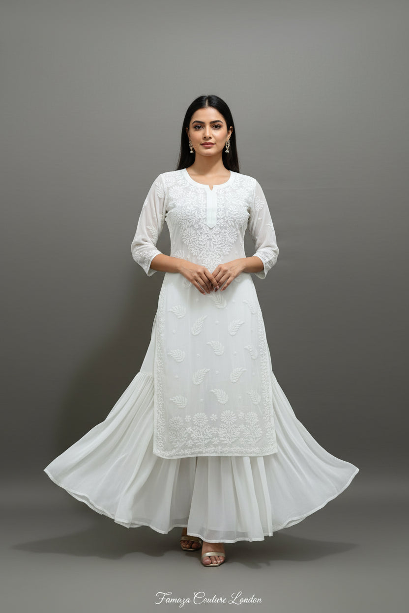A long, white viscose fabric kurti with ghasspati hand-embroidered Chikankari patterns by famaza couture