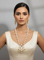 A luxury Bollywood style Mala Set featuring white beads, pearls, and stone inclusions, displayed on a mannequin bust.