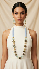 A luxury Tanjore Art Meenakari sky blue beaded Mala Set, featuring a regal bridal necklace and matching earrings with sky blue and gold details.