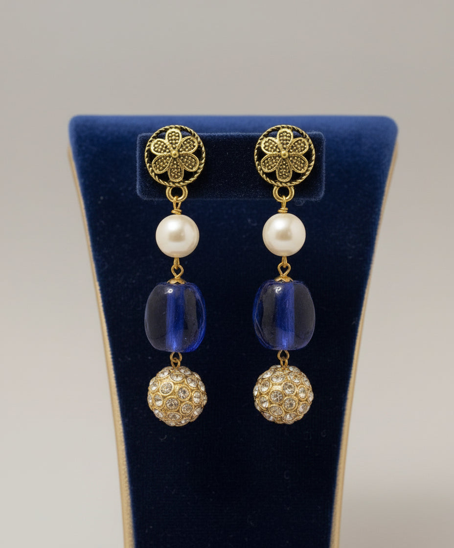 A luxury Tanjore earrings with blue and gold details. Paty wear earrings.