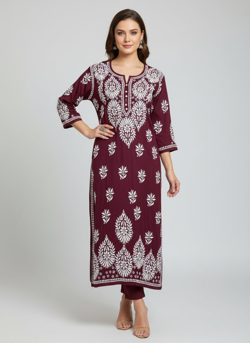 A maroon colour modal fabric 46 inches long kurti with white thread hand embriodery all over the kurti, sleeves and daaman.