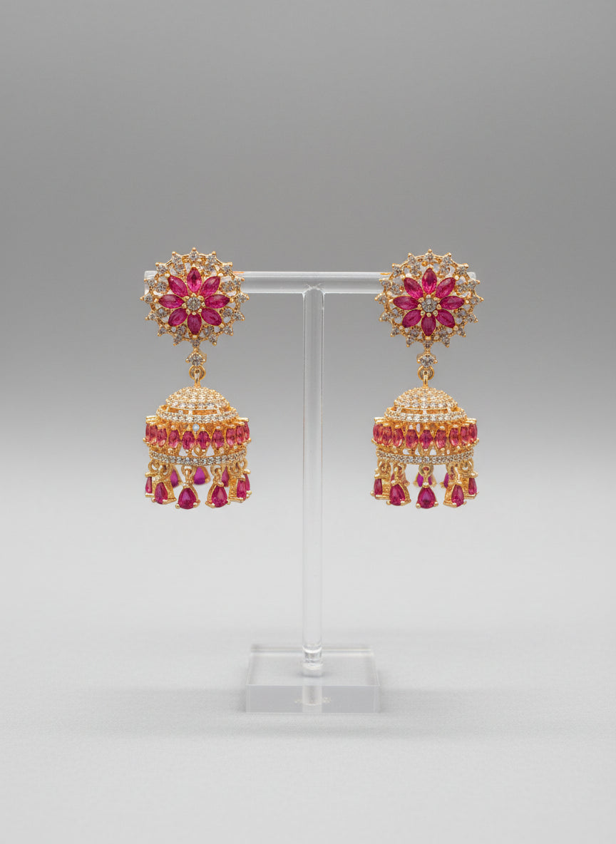 Gold-finish mini jhumka earrings with American diamonds – handcrafted statement jewellery.