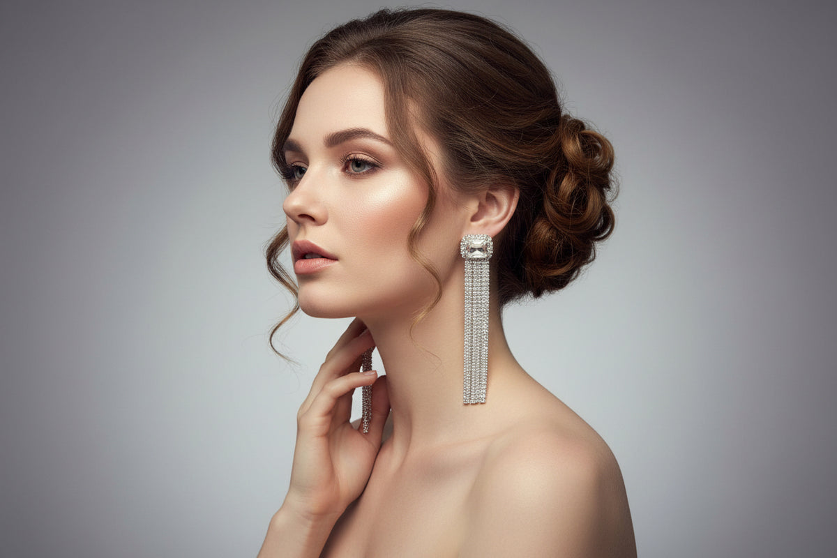 A pair of silver finish cubic zirconia drop earrings with white doublet semi precious stones. Party wear earrings.