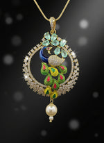 A rhodium-gold plated peacock design pendant with golden chain ,featuring vibrant green, blue, enamel accents, as well as sparkling crystal white and turquoise AD stones. Pendant with silver chain design is focused.