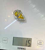 A ring weight is showing that is 15 grams