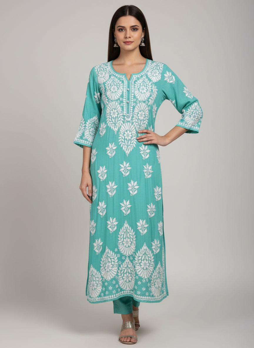 A turquoise colour modal fabric 46 inches long kurti with white thread hand embriodery all over the kurti, sleeves and daaman.