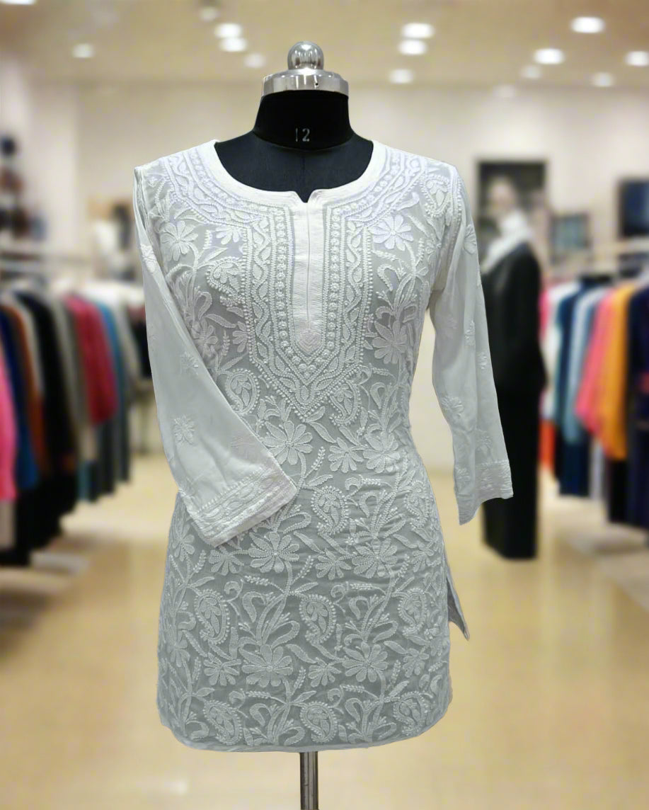 A white coloured viscose chikankari hand embroidered short kurti