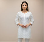 A white coloured viscose chikankari hand embroidered short kurti