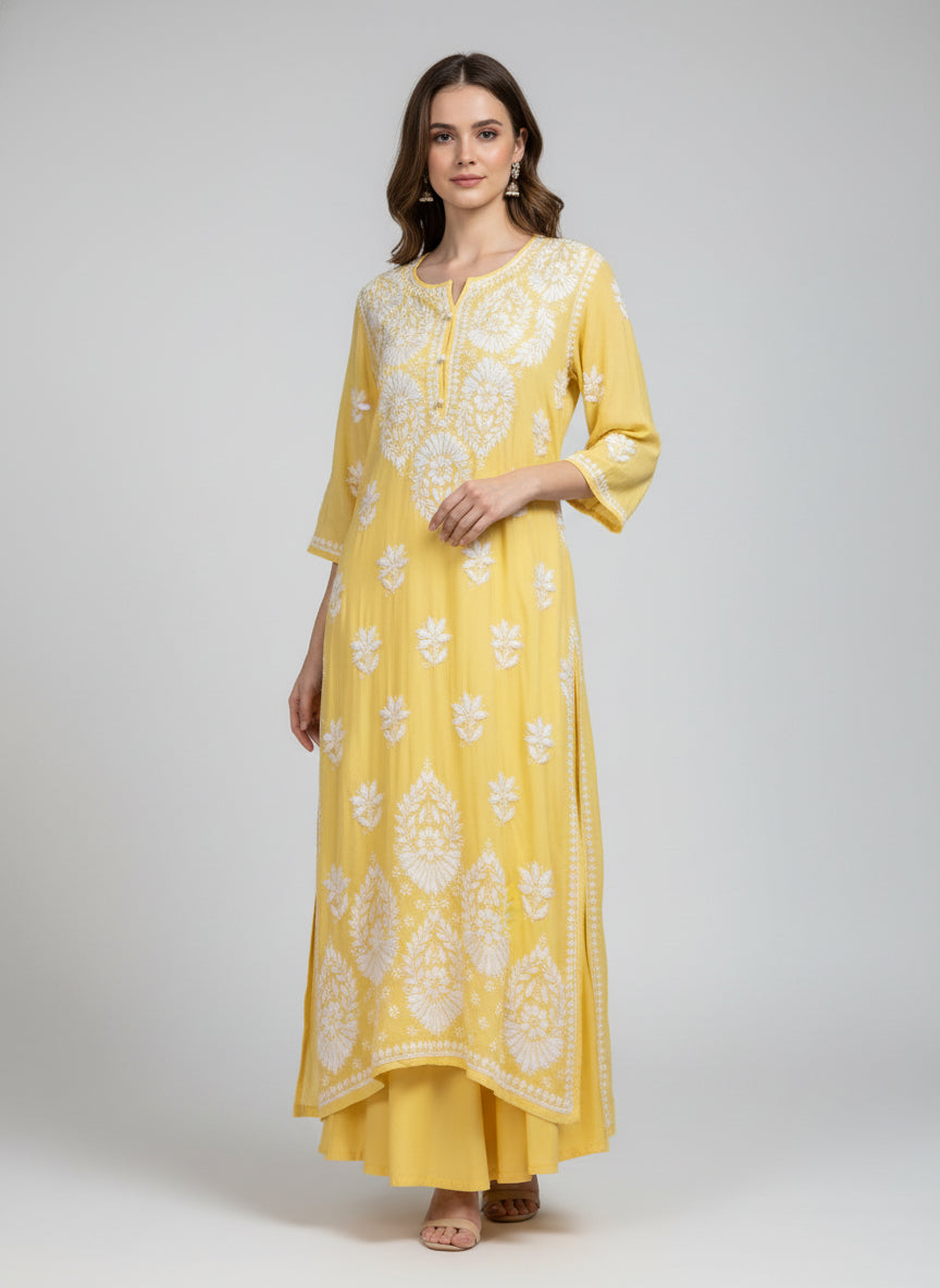 A yellow colour modal fabric 46 inches long kurti with white thread hand embriodery all over the kurti, sleeves and daaman.
