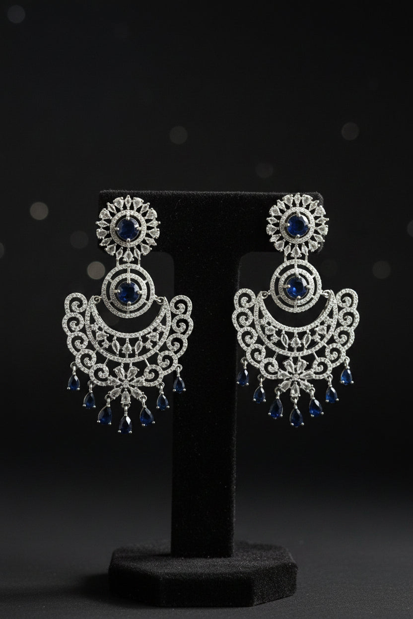 American diamond earrings with white and navy blue cubic zirconia stones.